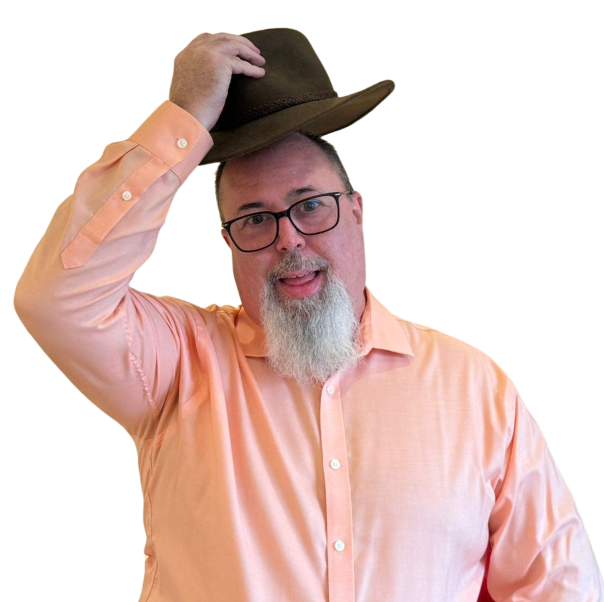 Trevor Gibbs is lifting a brown Fedora hat from his head in a welcoming gesture; he also has a long white/greyish beard, goatee style. He is wearing an orange shirt