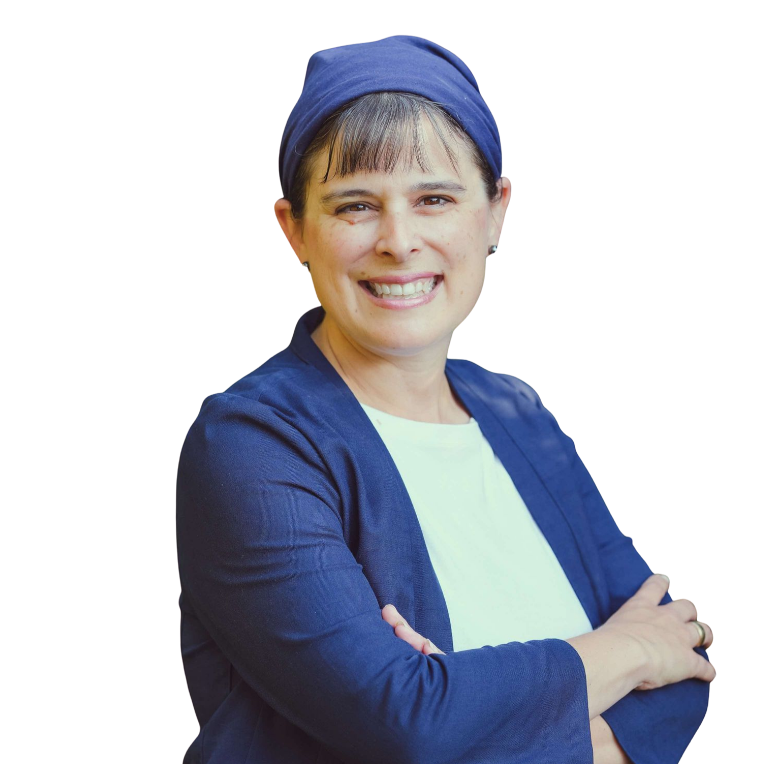 Jennifer Elia is wearing a blue jacket, a white shirt, and a matching blue head scarf. She has her arms folded in front of her